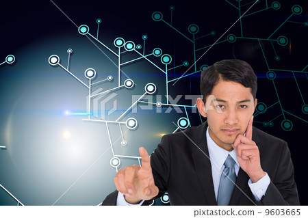 Composite image of thoughtful asian businessman pointing 9603665