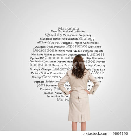 Composite image of businesswoman standing back to camera Composite image of businesswoman standing back to camera 9604190