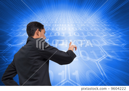 Composite image of unsmiling asian businessman pointing 9604222