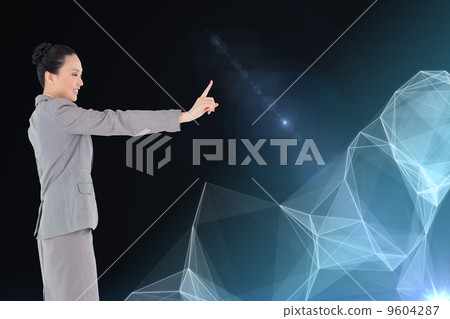 Composite image of smiling asian businesswoman pointing Composite image of smiling asian businesswoman pointing 9604287