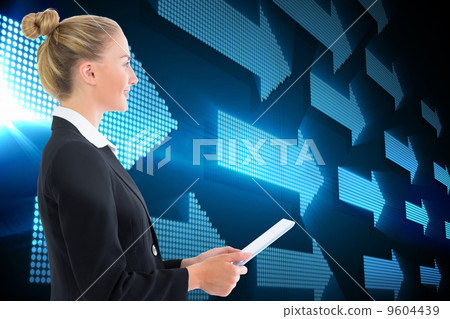 Composite image of businesswoman holding tablet Composite image of businesswoman holding tablet 9604439