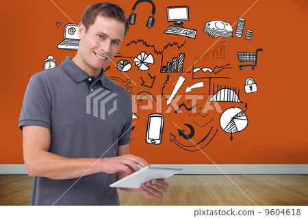 Composite image of smiling young man with tablet computer 9604618