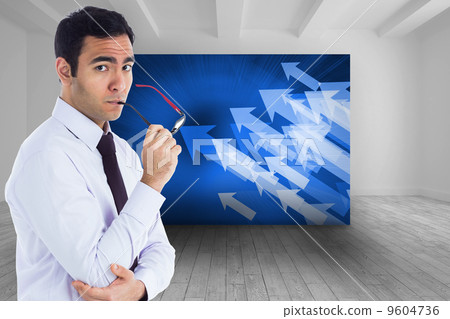 Composite image of unsmiling businessman holding glasses 9604736