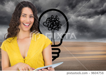 Composite image of smiling casual young woman scrolling on her t Composite image of smiling casual young woman scrolling on her t 9604758