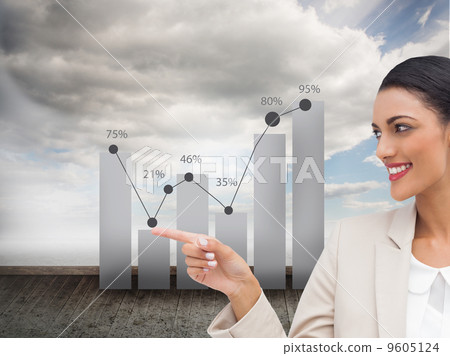 Composite image of smiling businesswoman pointing 9605124