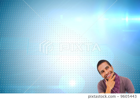 Composite image of thinking man sitting on floor using laptop an Composite image of thinking man sitting on floor using laptop an 9605443