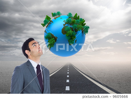 Composite image of unsmiling businessman standing 9605666