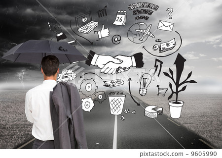 Composite image of businessman standing back to camera holding u 9605990