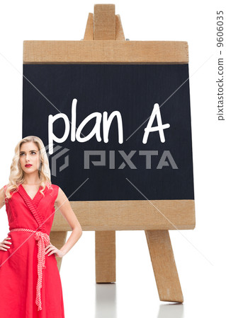 Composite image of elegant blonde standing hands on hips 9606035