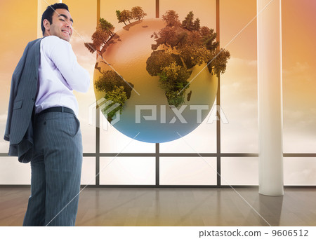 Composite image of smiling businessman standing 9606512