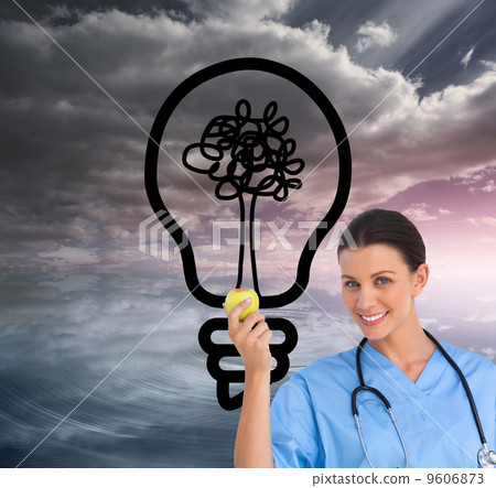 Composite image of happy surgeon holding an apple and smiling at 9606873