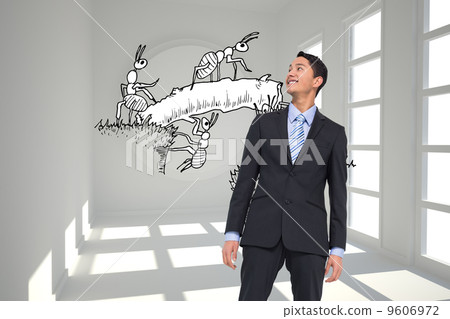 Composite image of smiling asian businessman Composite image of smiling asian businessman 9606972