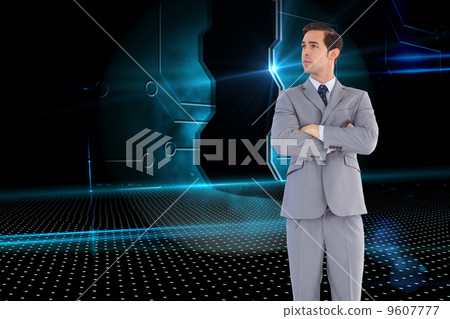 Composite image of serious businessman with arms crossed 9607777