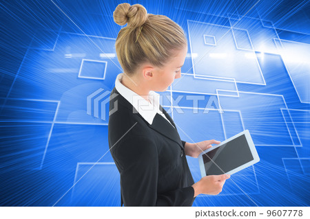 Composite image of businesswoman holding tablet Composite image of businesswoman holding tablet 9607778