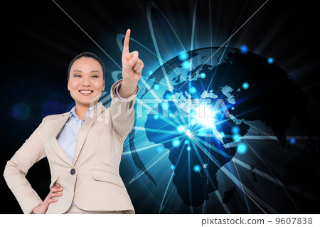 Composite image of smiling asian businesswoman pointing Composite image of smiling asian businesswoman pointing 9607838