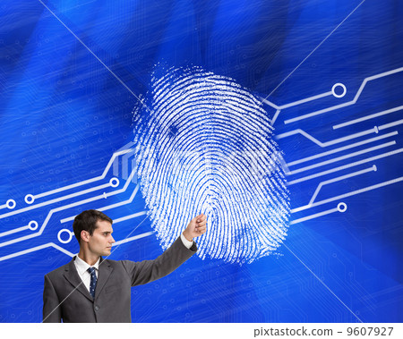 Composite image of stern businessman pointing 9607927