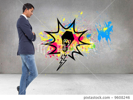 Composite image of unsmiling casual businessman with arms crosse 9608246