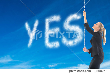 Composite image of businesswoman pulling a chain 9608748
