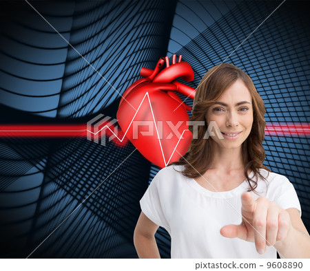 Composite image of attractive brunette pointing Composite image of attractive brunette pointing 9608890
