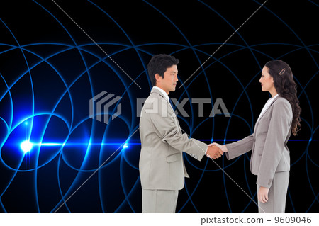 Composite image of side view of hand shaking trading partners Composite image of side view of hand shaking trading partners 9609046