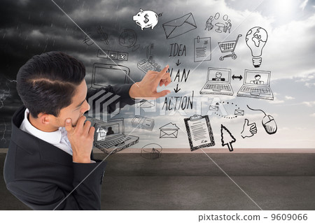 Composite image of thoughtful asian businessman pointing Composite image of thoughtful asian businessman pointing 9609066