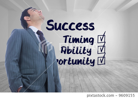 Composite image of unsmiling businessman standing Composite image of unsmiling businessman standing 9609155