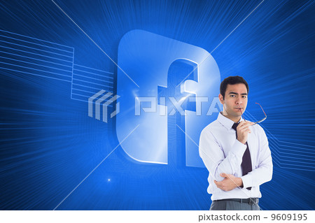 Composite image of unsmiling businessman holding glasses Composite image of unsmiling businessman holding glasses 9609195