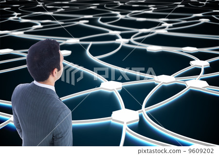 Composite image of businessman standing Composite image of businessman standing 9609202