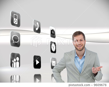 Composite image of stylish man smiling and gesturing Composite image of stylish man smiling and gesturing 9609678