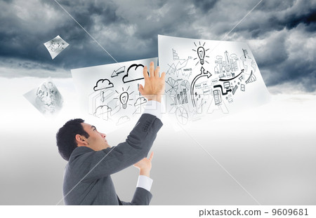 Composite image of unsmiling businessman with arms raised 9609681