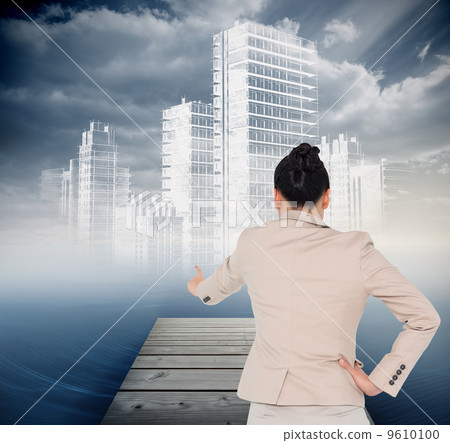Composite image of asian businesswoman pointing Composite image of asian businesswoman pointing 9610100