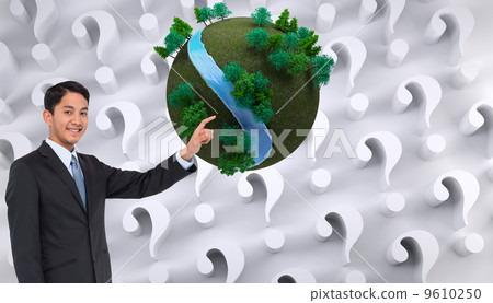 Composite image of smiling asian businessman pointing Composite image of smiling asian businessman pointing 9610250
