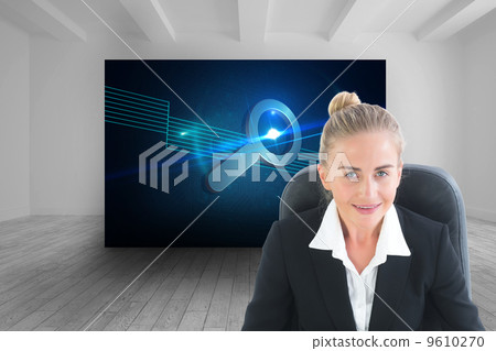 Composite image of businesswoman sitting on swivel chair with ta 9610270