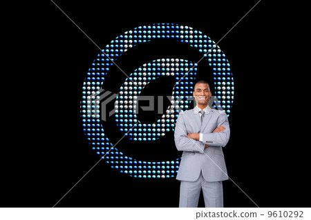 Composite image of assertive businessman on phone Composite image of assertive businessman on phone 9610292
