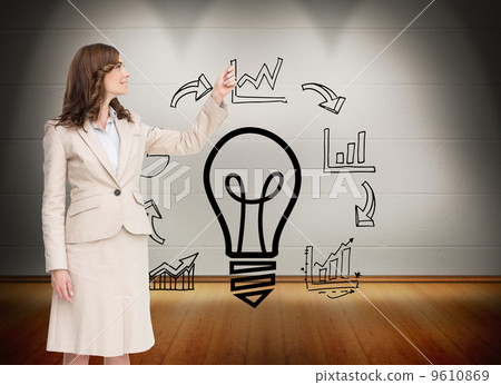 Composite image of brunette businesswoman pulling Composite image of brunette businesswoman pulling 9610869