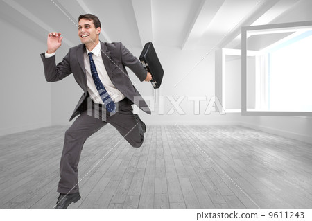 Composite image of cheerful businessman in a hury 9611243