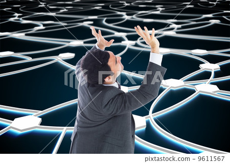 Composite image of unsmiling businessman with arms raised Composite image of unsmiling businessman with arms raised 9611567