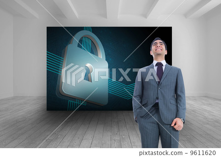 Composite image of smiling businessman standing 9611620