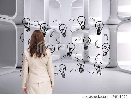 Composite image of classy businesswoman walking away from camera Composite image of classy businesswoman walking away from camera 9611621