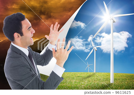 Composite image of excited businessman with arms raised Composite image of excited businessman with arms raised 9611625