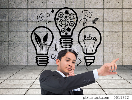 Composite image of thoughtful asian businessman pointing 9611822