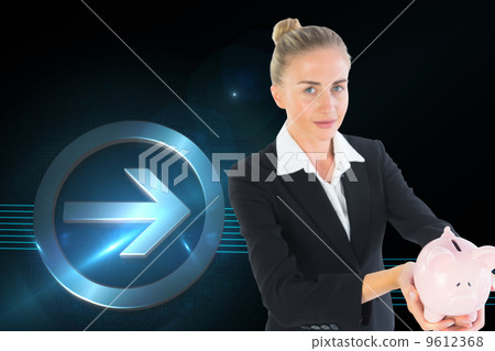 Composite image of businesswoman holding piggy bank Composite image of businesswoman holding piggy bank 9612368