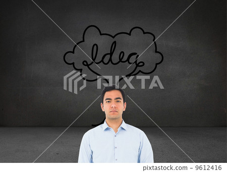 Composite image of unsmiling casual man standing 9612416