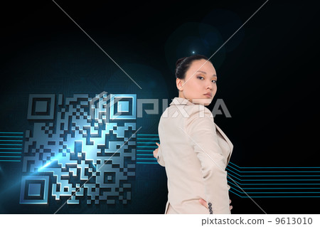 Composite image of unsmiling asian businesswoman pointing 9613010