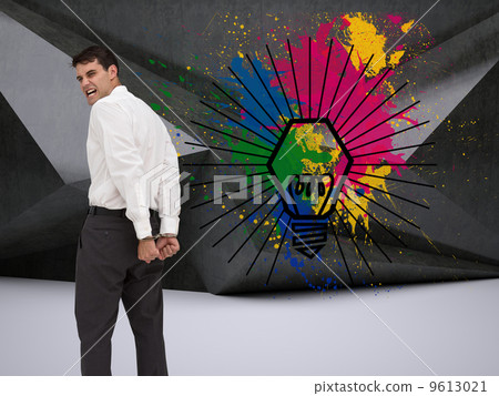Composite image of rear view of young businessman wearing handcu Composite image of rear view of young businessman wearing handcu 9613021