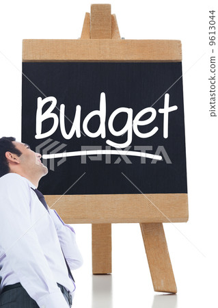 Composite image of smiling businessman standing Composite image of smiling businessman standing 9613044