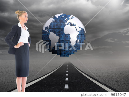 Composite image of businesswoman standing with hands on hips Composite image of businesswoman standing with hands on hips 9613047
