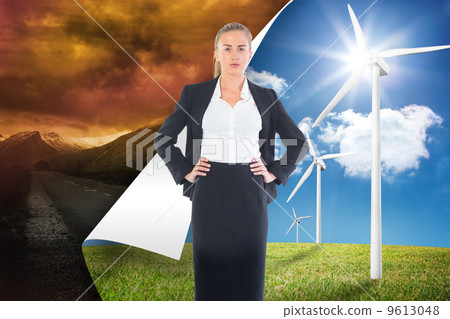 Composite image of businesswoman standing with hands on hips Composite image of businesswoman standing with hands on hips 9613048