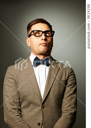 confident nerd in eyeglasses and bow tie