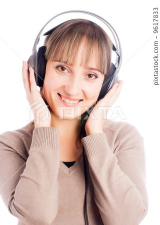 Pretty woman listening music 9617833